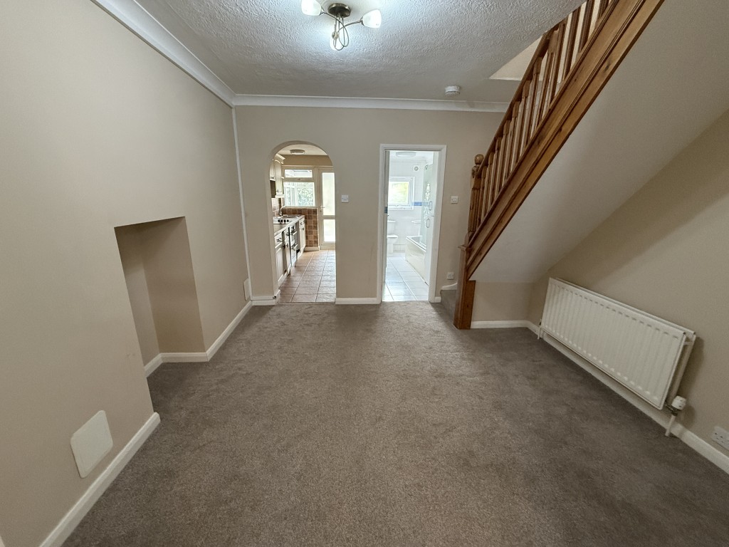 Lot: 200 - VACANT TWO-BEDROOM HOUSE - Dining room looking towards kitchen